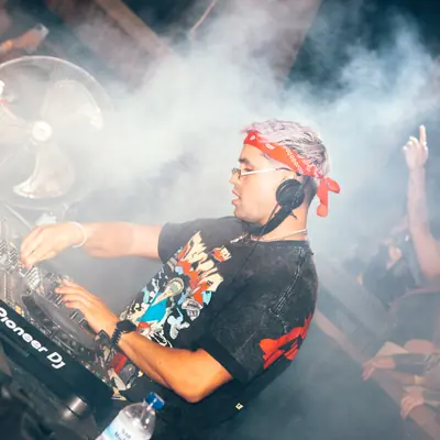 JK mixing surrounded by stage haze